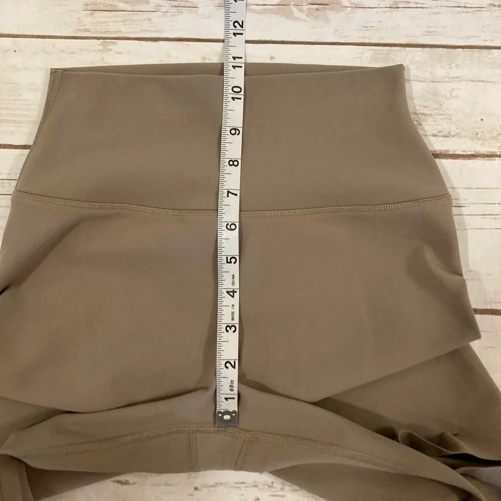 ALO YOGA HIGH WAISTED RIPPED WARRIOR LEGGING IN TAN XS
